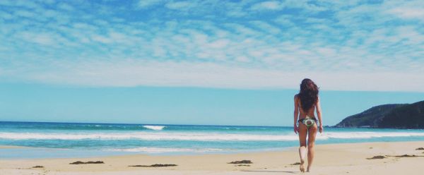 Sunny beach with bikini